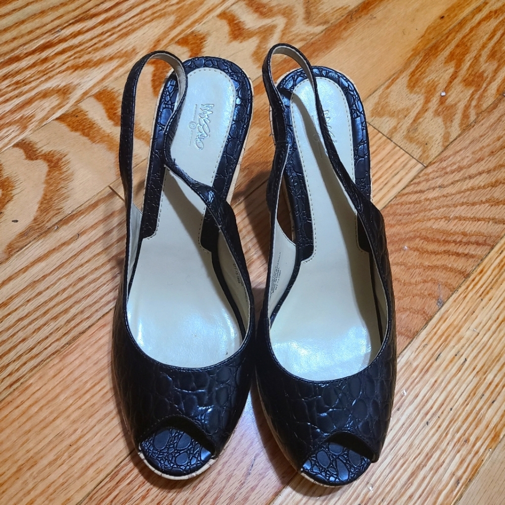 Peep toe black wedges